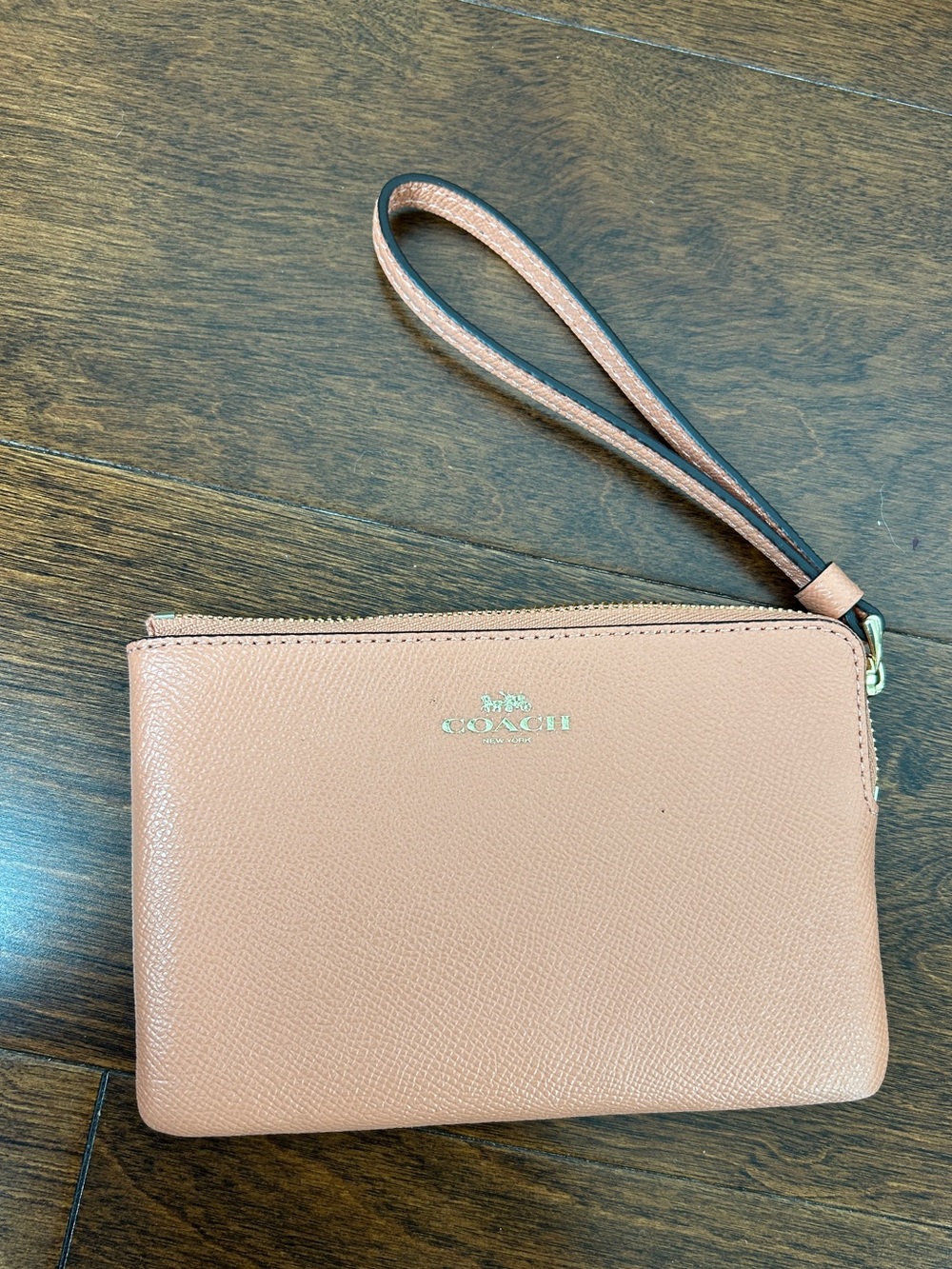Tan Coach wristlet